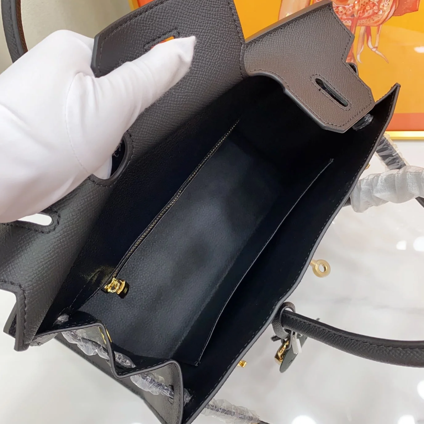 Sleek Solid Black Fine Grain Sharp Seam Structured Trapezoid Tote With Warm Golden Twist Lock Hardware And Detachable Matching Shoulder Strap