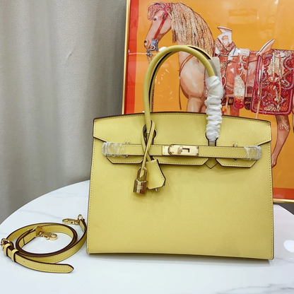 Fresh Pale Lemon Yellow Fine Grain Crisp Seam Structured Trapezoid Tote With Warm Golden Twist Lock Hardware And Matching Detachable Shoulder Strap