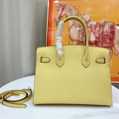Fresh Pale Lemon Yellow Fine Grain Crisp Seam Structured Trapezoid Tote With Warm Golden Twist Lock Hardware And Matching Detachable Shoulder Strap
