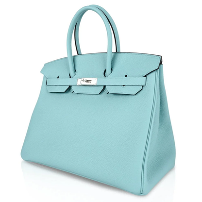 Serene Sea Foam Aquamarine Pebble Grain Large Trapezoid Hand Tote With Sleek Cool Silvery Twist Lock Hardware And Matching Suspended Textured Metal Padlock Charm